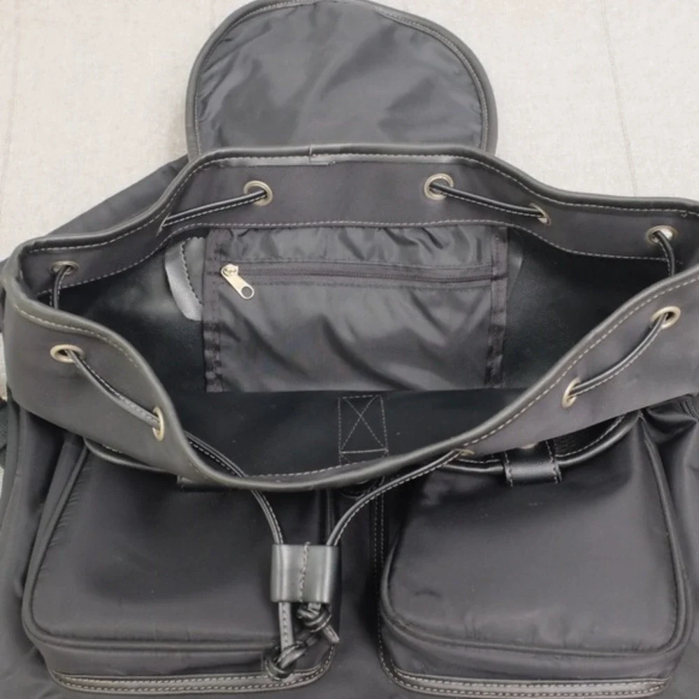 Ebel Black Nylon Faux Leather Turn Lock Cinch‎ Top Travel Backpack